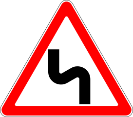 Знак 1.12.2 Опасные повороты с первым поворотом налево